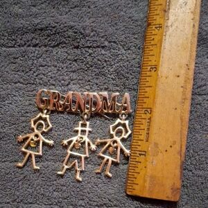 Gold Grandma Brooch with Family Figures
